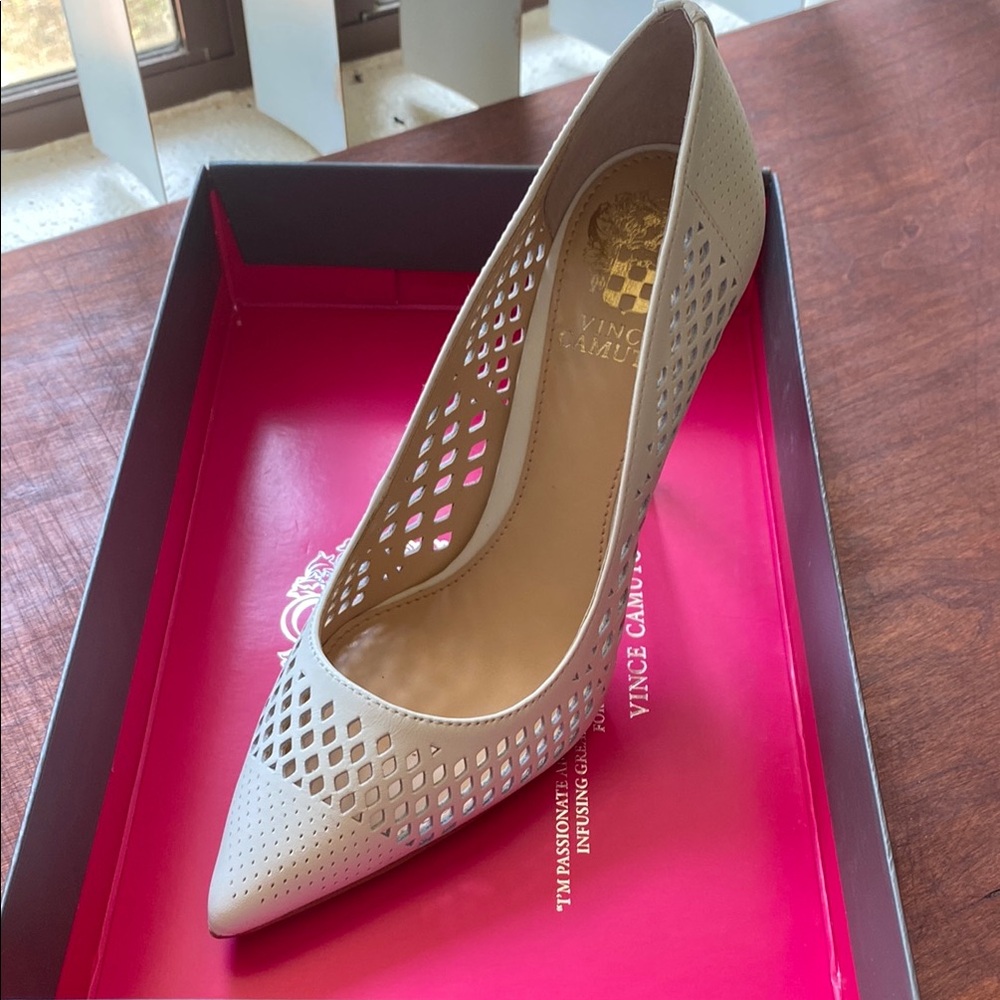 Vince Camuto Stiletto Heels with Perforated Design
I did wear it only one time
